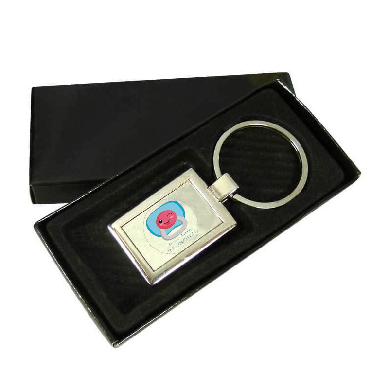 Llavero personalizado en caja para recuerdos de bautizo
