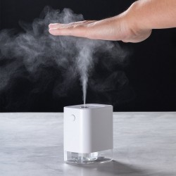 Dispensador automático higiénico de alcohol con sensor de movimiento