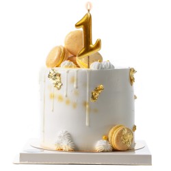 Vela de cumpleaños en color oro del número 1